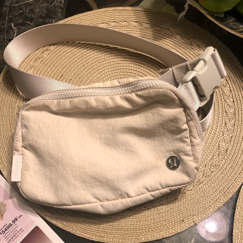 - Lululemon Cream Belt Bag